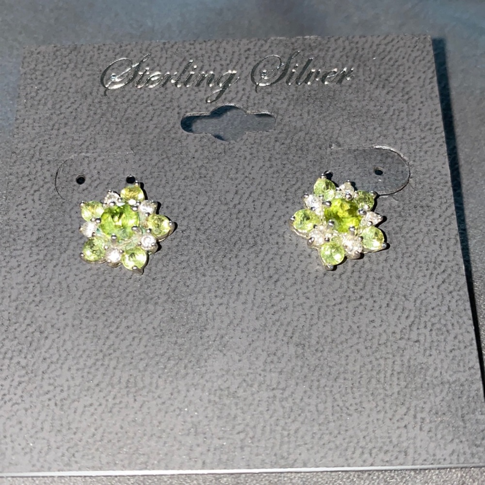 Dainty peridot earrings set in sterling silver.